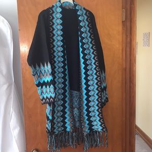 Black, teal, and grey sweater cover